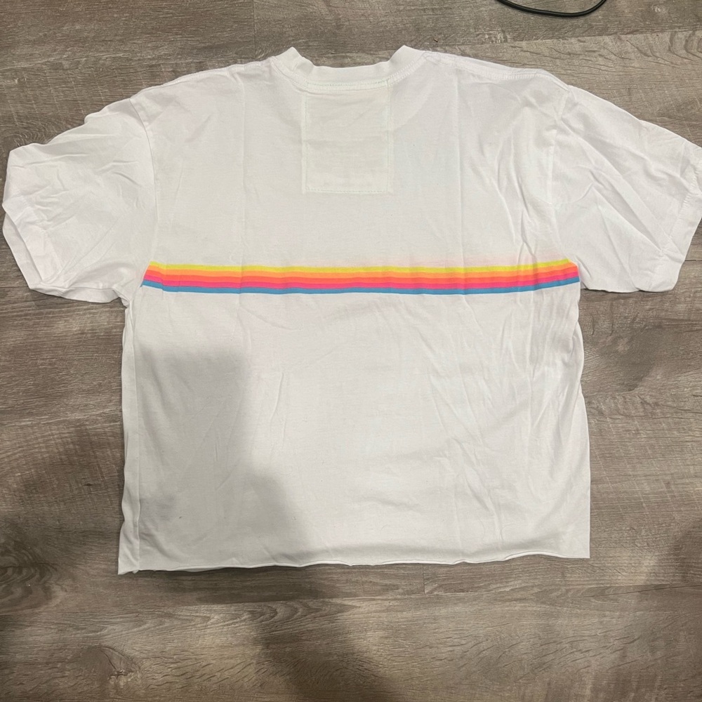 Aviator Nation white T-shirt with bright neon colored stripes on front and back.